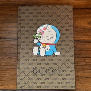 Brand New Gucci Brown Monogram Notebook with Blue Doraemon Illustration